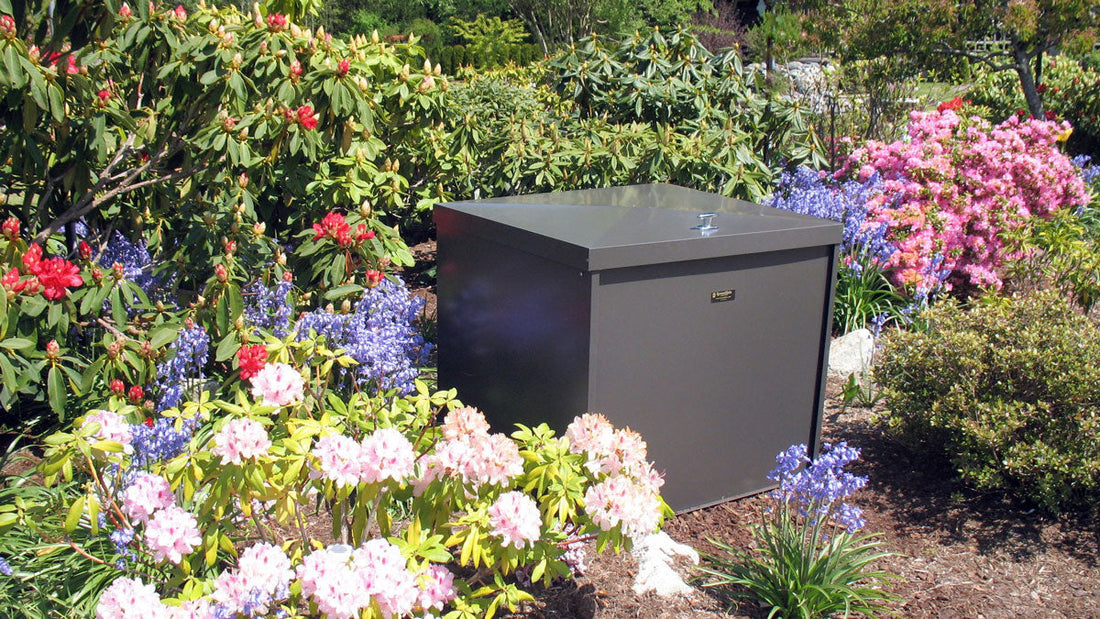 Speedibin composter in a flower garden